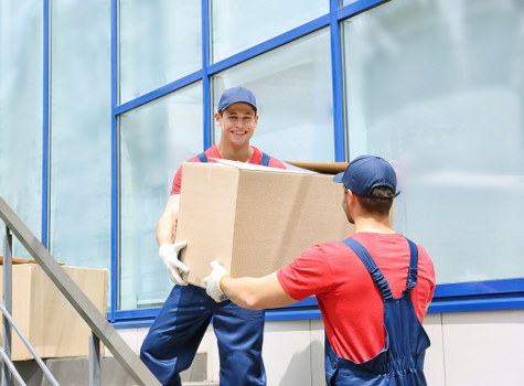 Professional house movers assisting with a move in Ware