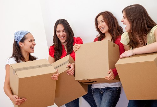 Experienced movers handling furniture with care