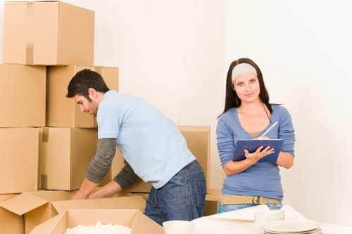 Professional house movers assisting with a move in West Ham