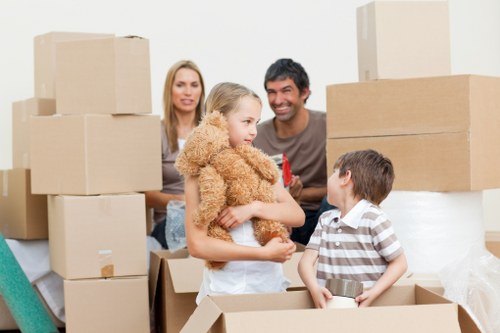House movers packing boxes for relocation
